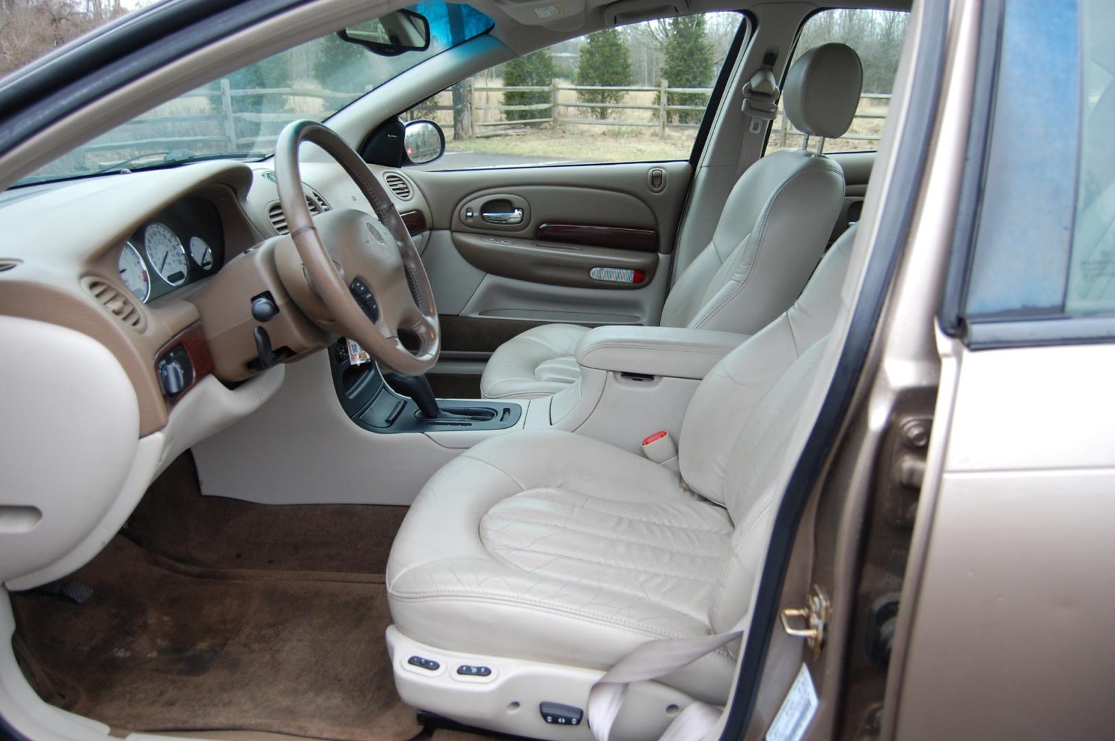 2000 Tan /Tan Leather Chrysler 300M (2C3HE66G8YH) with an 3.5 liter V6 engine, Automatic transmission, located at 6528 Lower York Road, New Hope, PA, 18938, (215) 862-9555, 40.358707, -74.977882 - Here for sale is a good running 2000 Chrysler 300M. Under the hood is a strong running 3.5 liter V6 which puts power to the font wheels via a smooth shifting automatic transmission. Features include; Tan leather interior 2 keys, 2 remotes, wood trim, cruise control, tilt steering wheel, AC, power - Photo#8